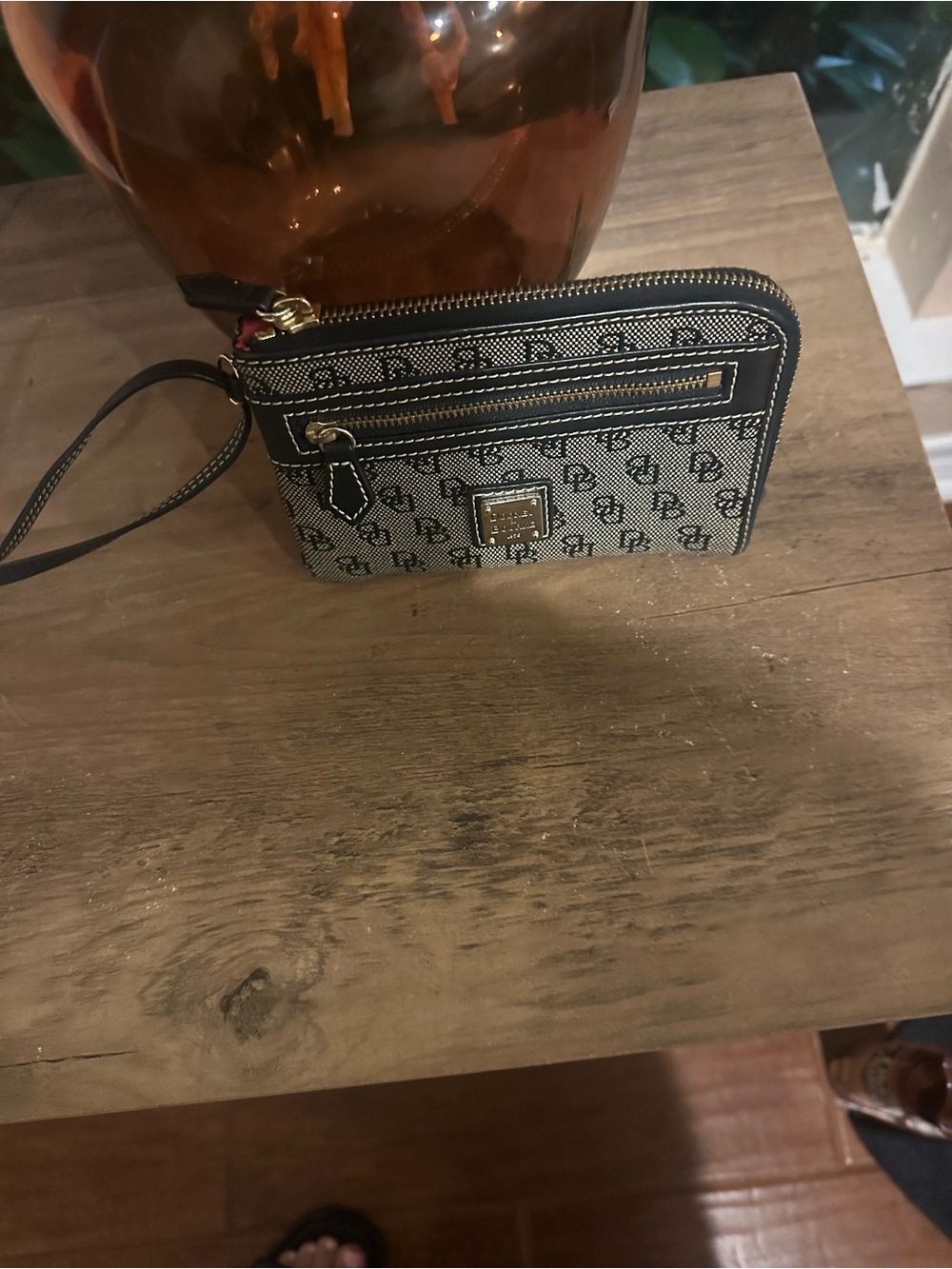 Dooney & Bourke Black and Beige Signature Logo Wristlet